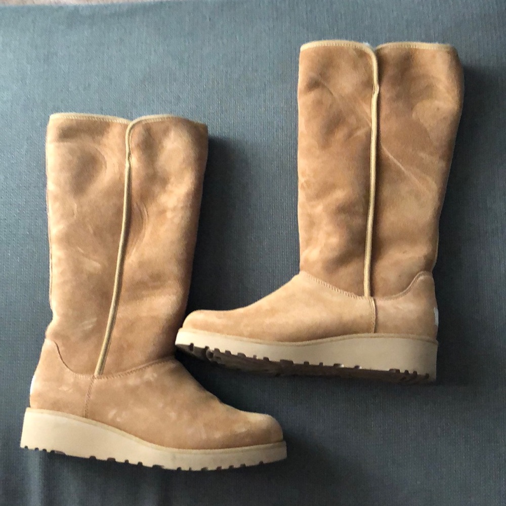 Brand new comfy UGG boots. Nice for winter. Size 8. Brown/light tan.